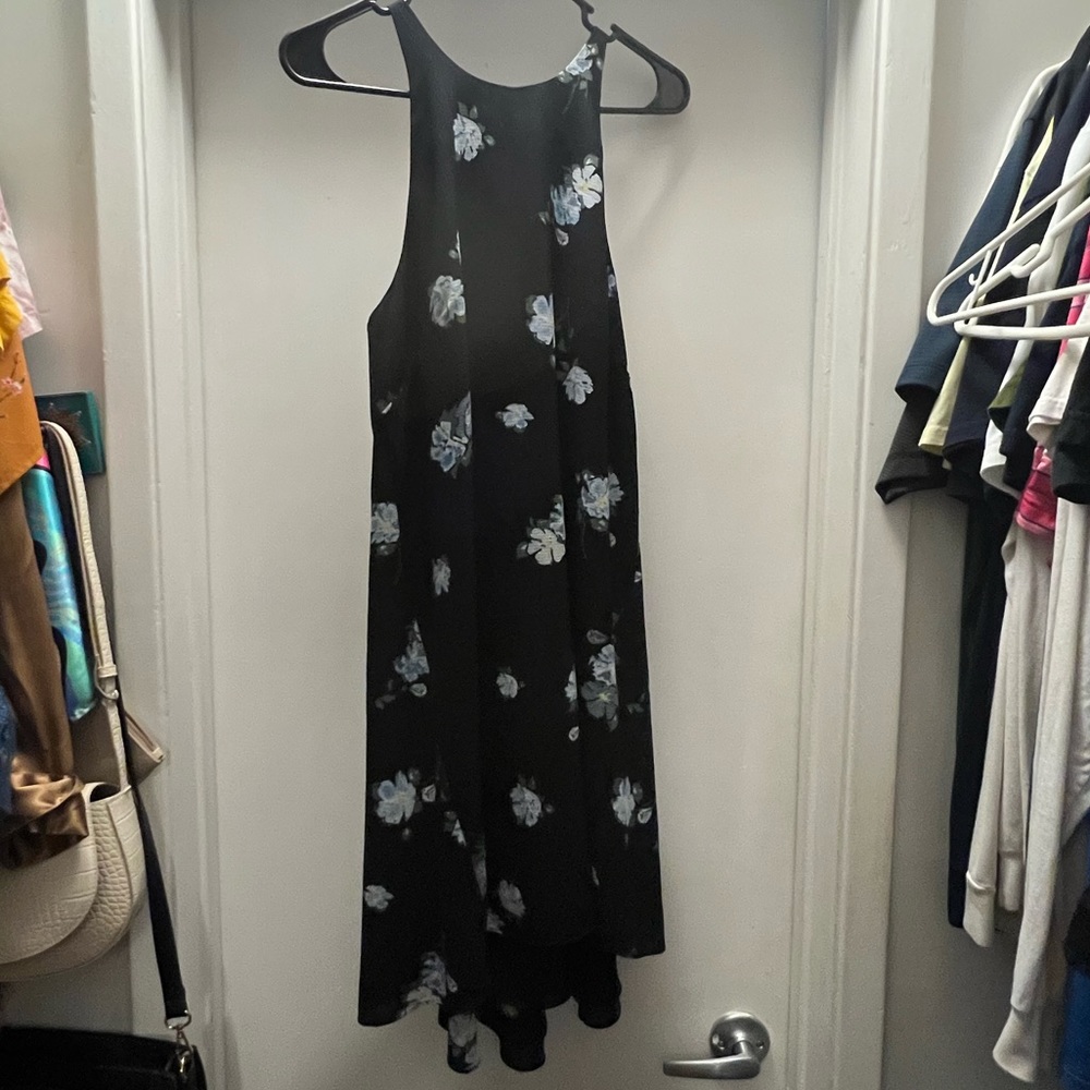 Knee length black dress with blue flowers